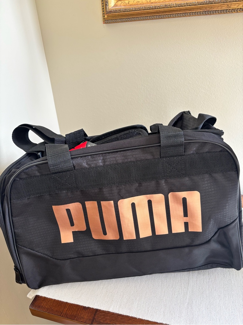Puma Black Dispatch Duffel Bag with Metallic Rose Logo
